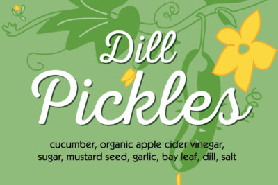 dill pickle label with cucumbers hanging on vine